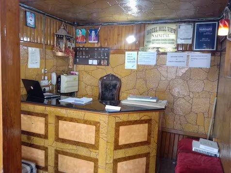 reception with chair at hill view in nainital hotel_Image