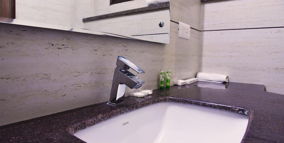 bathroom with commode at hotel amritsar international in amritsar hotel_Image