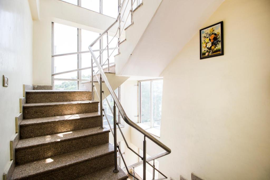 a stairs at hotel sunshine residency castle in Noida hotel_Image