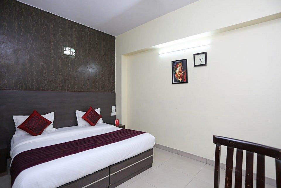 a double bed room with a large bed at hotel sunshine residency castle in Noida hotel_Image