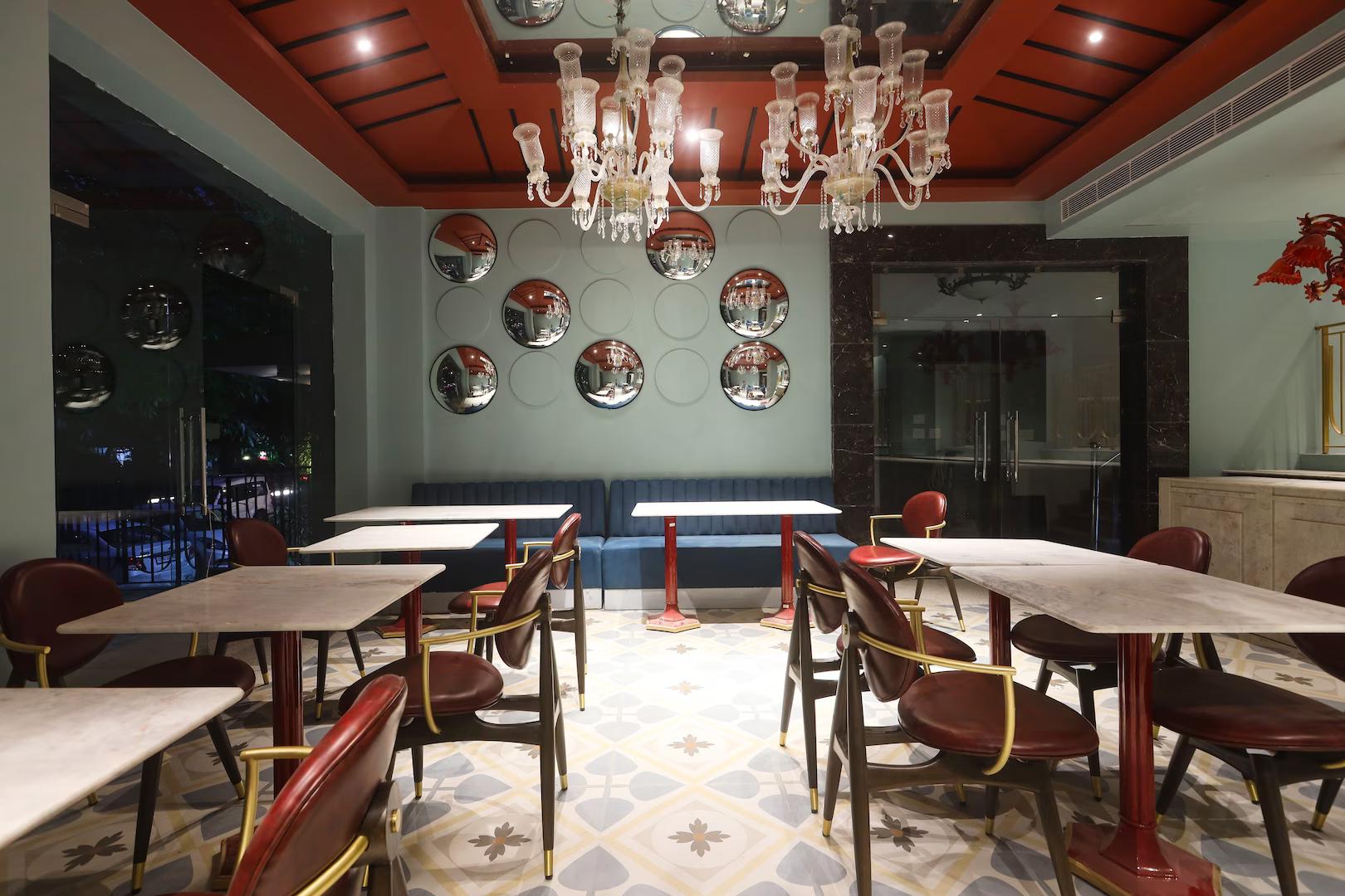 a hotel with dinner area at The Saga Hotel in New Delhi hotel_Image