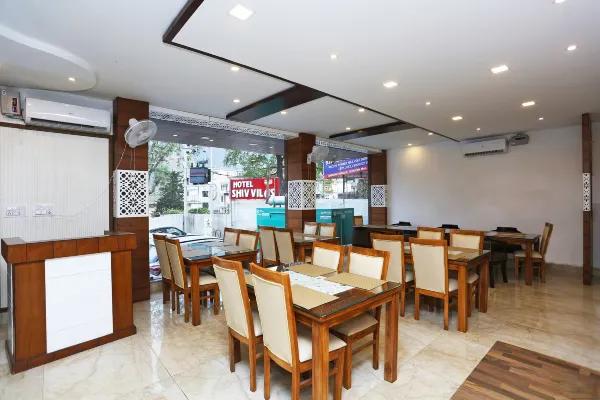 seating area with chairs at hotel shiv vilas in Rishikesh hotel_Image