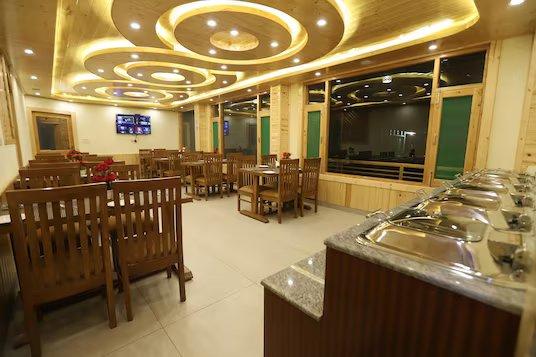 seating area at golden wood manali in manali hotel_Image