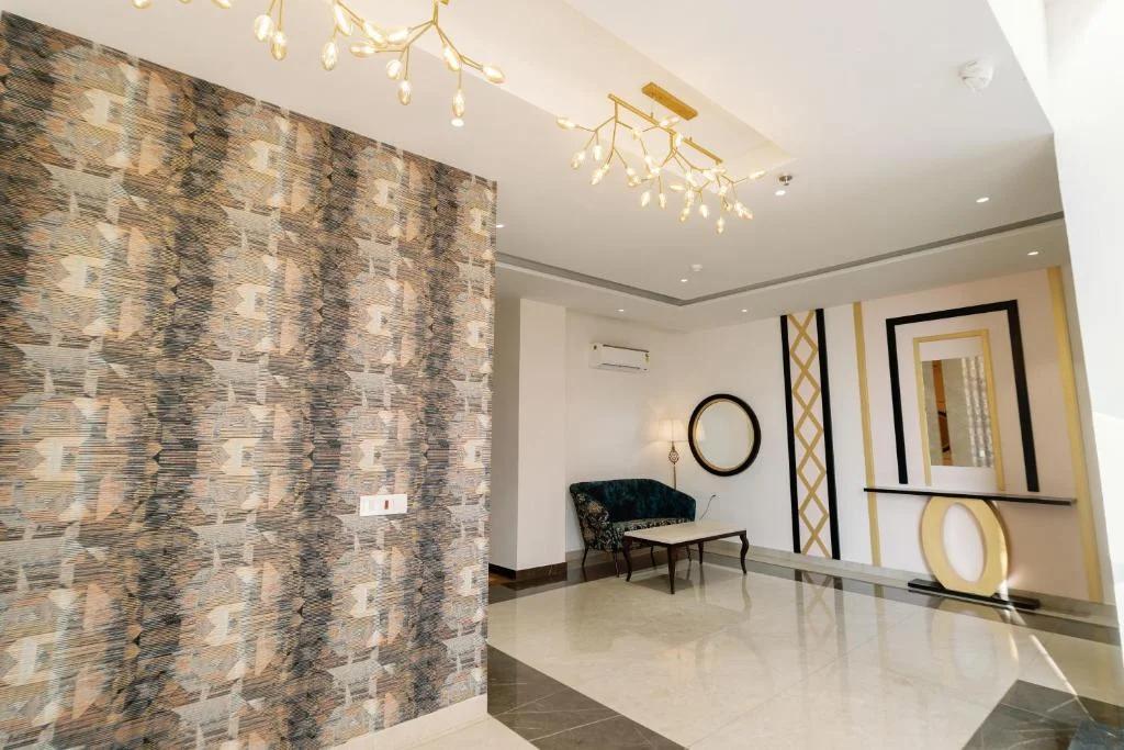 seating area with sofa at grand heritage hotel in ludhiana hotel_Image