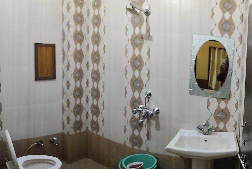 bathroom with commode at hotel golden tulip in jaisalmer hotel_Image