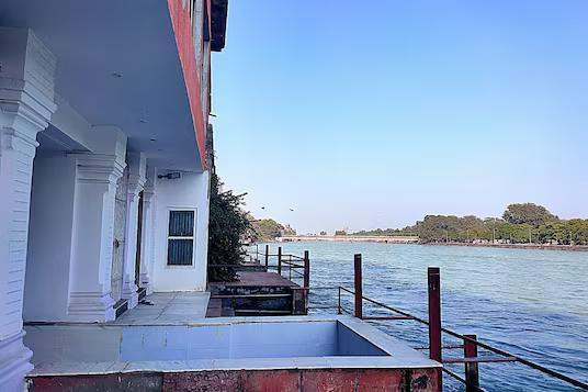 seating area with river view at Anand Niketan in Haridwar hotel_Image