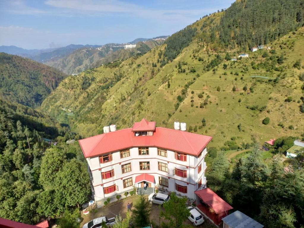 facade at hotel hassan valley retreat in shimla hotel_Image