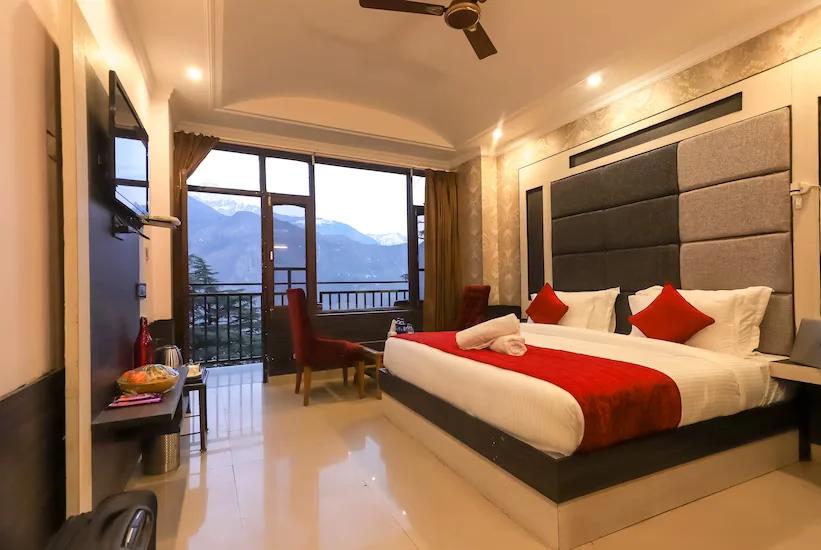 a bedroom with a large bed at Hotel holiday hill in Dharamshala hotel_Image