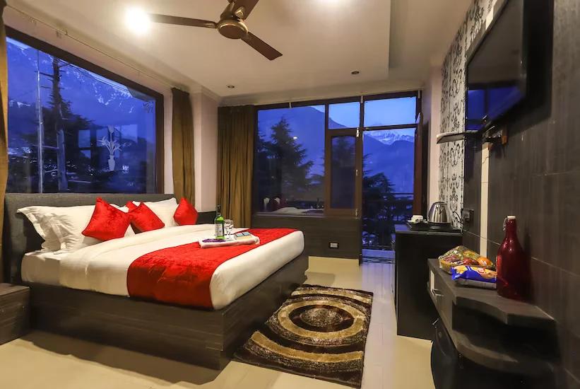 a bedroom with a large bed at Hotel holiday hill in Dharamshala hotel_Image