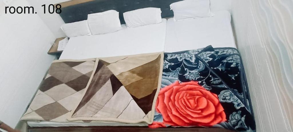 a double bed room with t.v at hotel raghav guest house at mathura hotel_Image