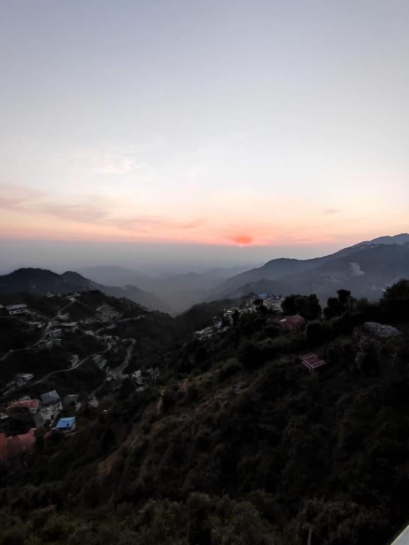 a mountains view from hotel on roof at at hotel spring wood in Mussoorie hotel_Image