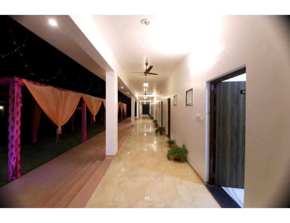 outside view of hotel with lights and dacoration at rajwada hotel in mathura hotel_Image