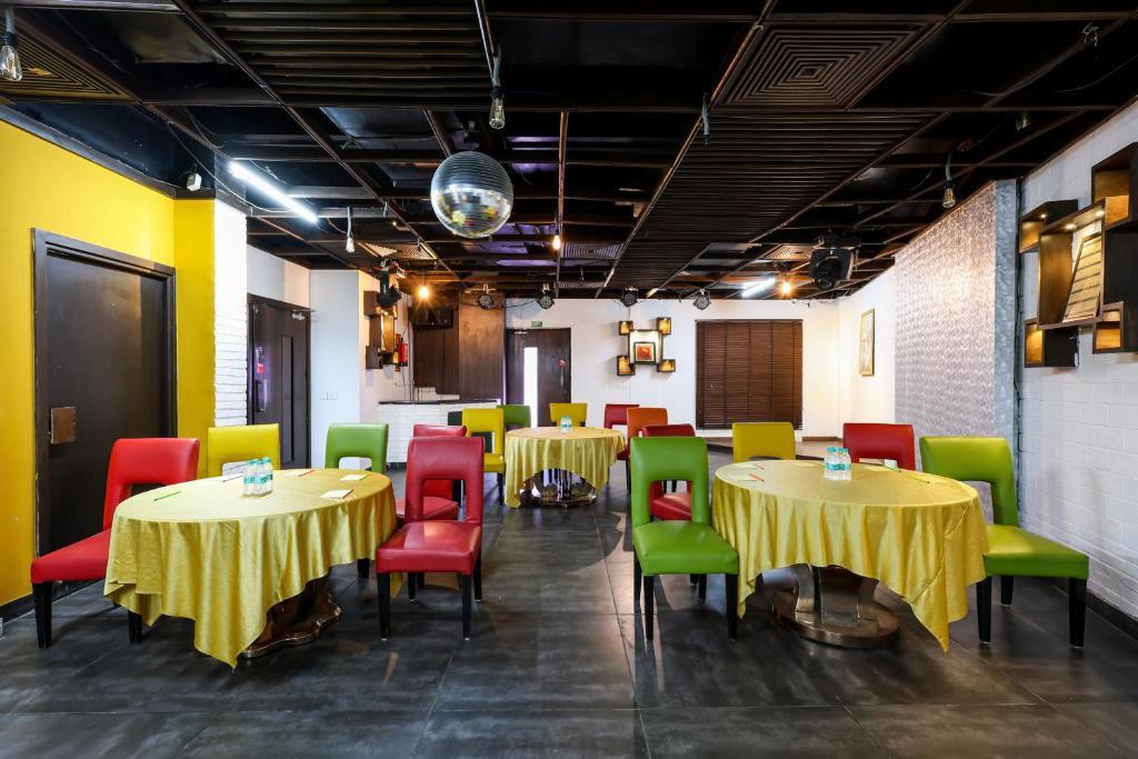 dinner area with chairs and table at the iris a boutique hotel in Gurugram hotel_Image