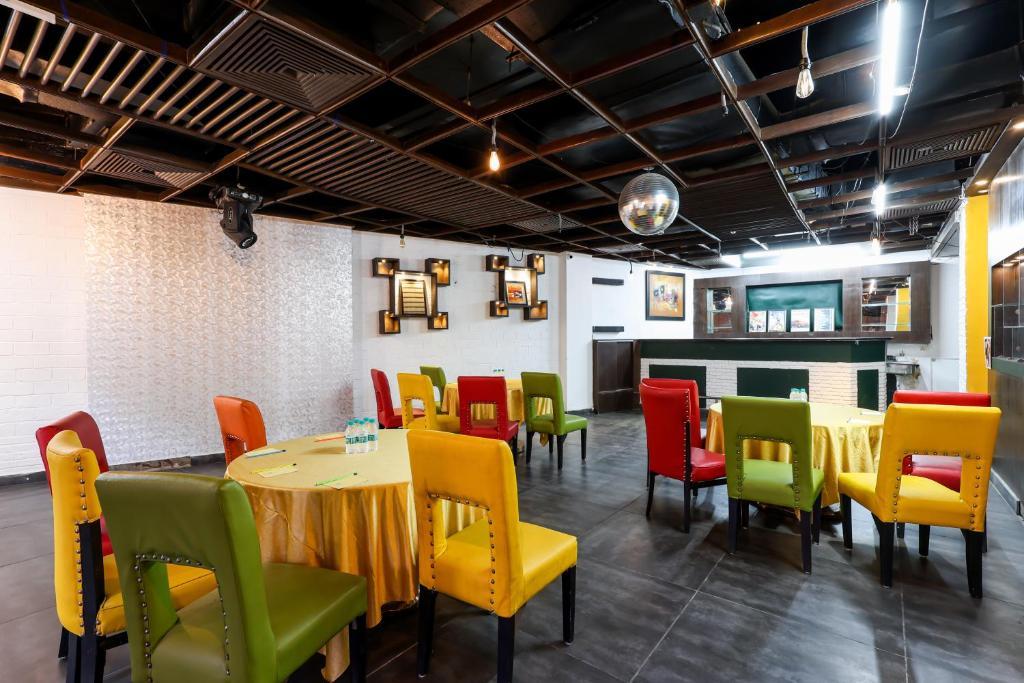 dinner area with chairs and table at the iris a boutique hotel in Gurugram hotel_Image