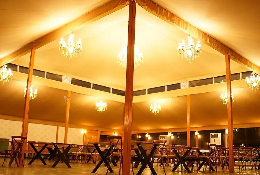 a dinner area with chairs and table at kurja resort in jodhpur hotel_Image