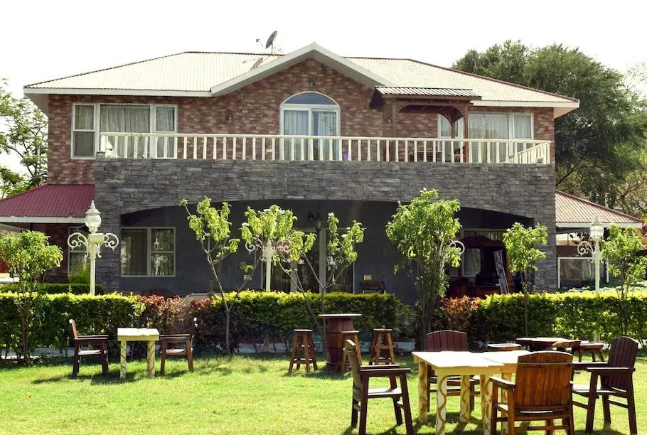 facade with garden at park exotica resort in jaipur hotel_Image